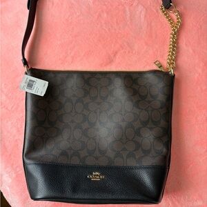 Coach Brown and Black Signature Crossbody Purse with Gold Chain.
Brand New.